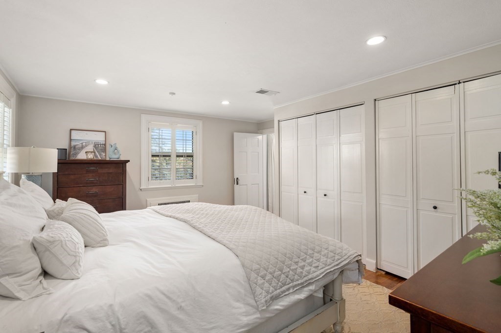 14 Hillcroft Road Boston, MA 02130 - Photo 15 of 34 a bedroom with a bed and a dresser