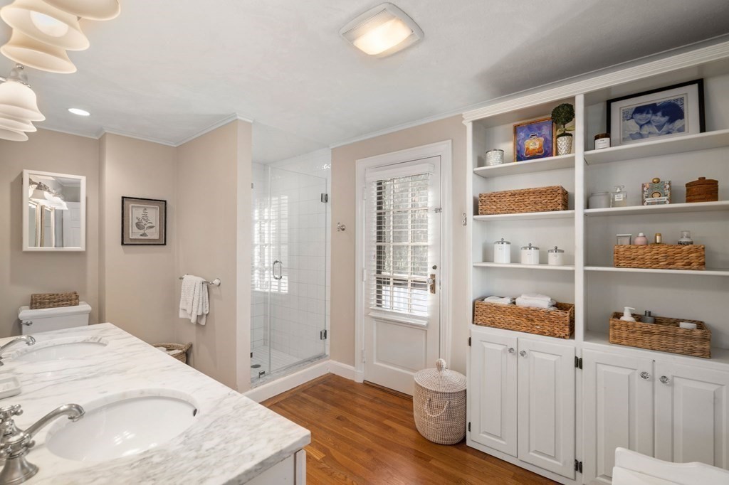 14 Hillcroft Road Boston, MA 02130 - Photo 16 of 34 a spacious bedroom with a bed and a window