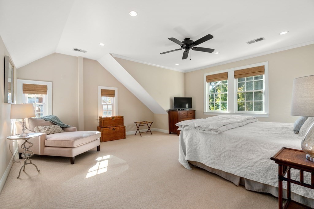 14 Hillcroft Road Boston, MA 02130 - Photo 18 of 34 a spacious bedroom with a bed and window