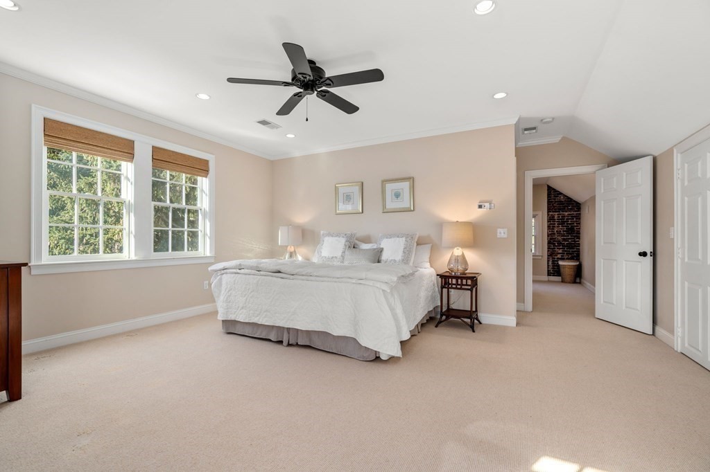 14 Hillcroft Road Boston, MA 02130 - Photo 19 of 34 a bed room with a bed and a window