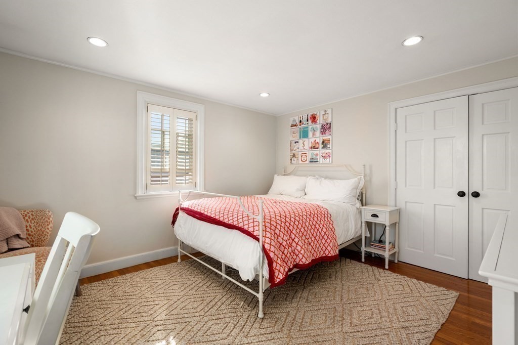 14 Hillcroft Road Boston, MA 02130 - Photo 22 of 34 a bedroom with a bed and a window
