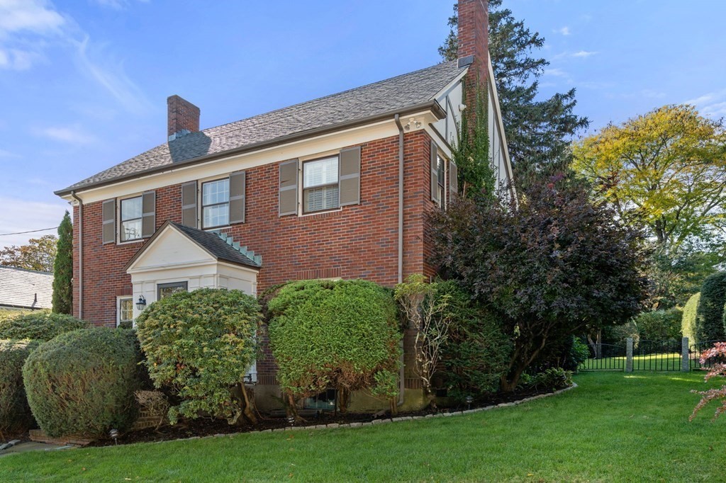 14 Hillcroft Road Boston, MA 02130 - Photo 24 of 34 a front view of a house with garden
