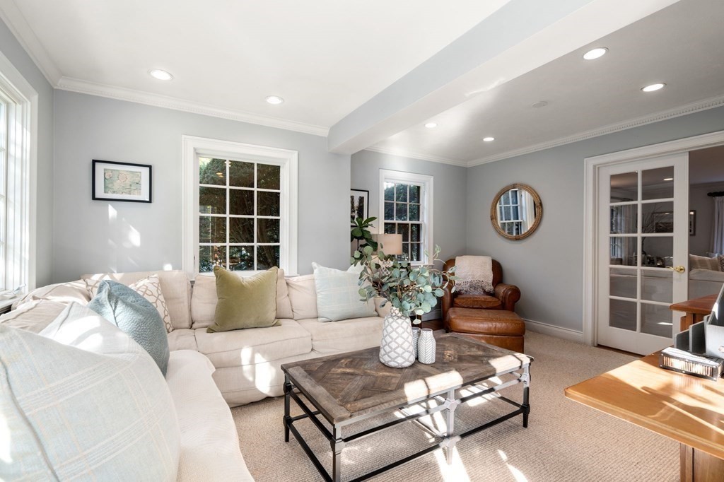 14 Hillcroft Road Boston, MA 02130 - Photo 8 of 34 a living room with furniture potted plant and a window