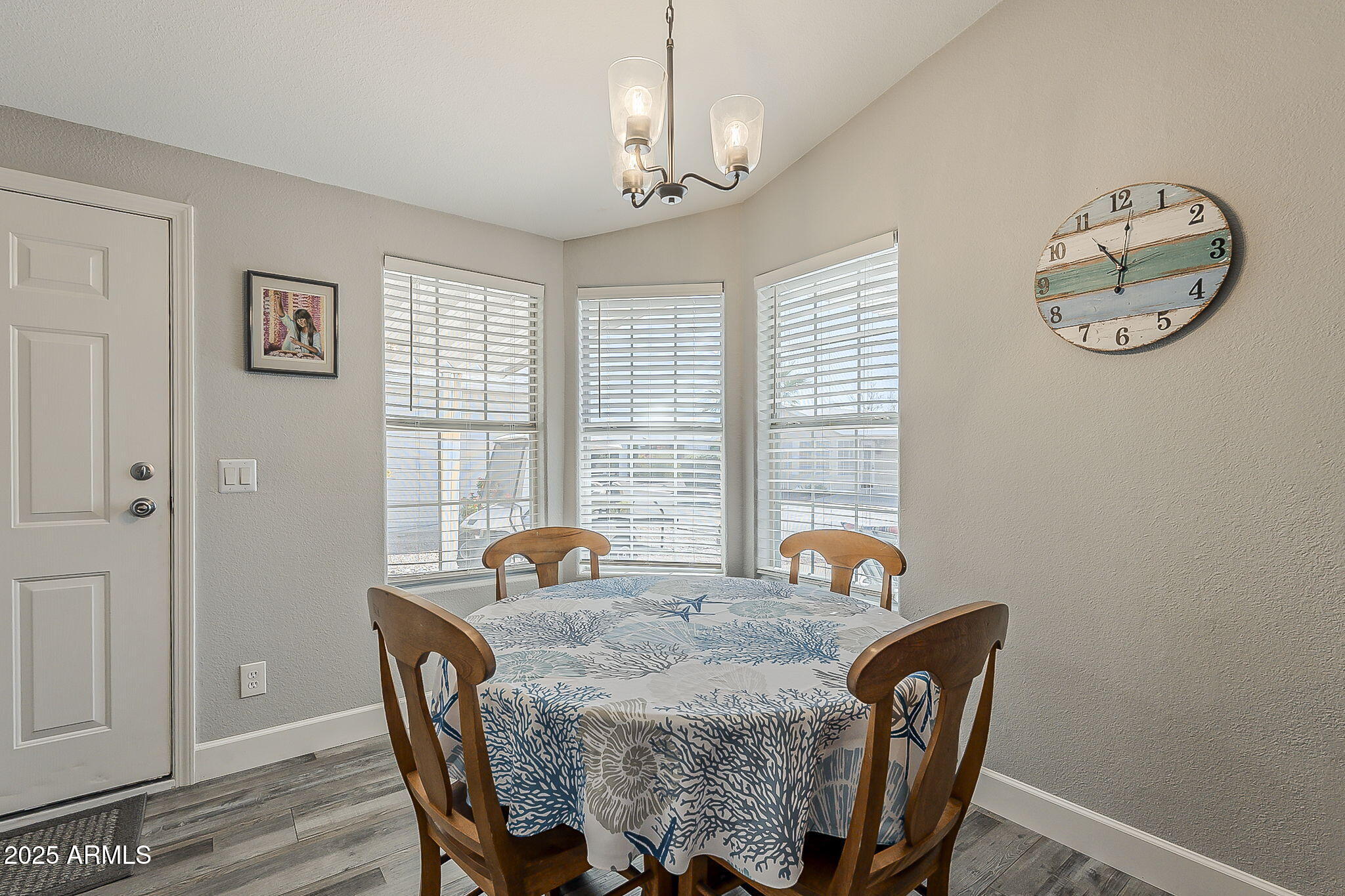 215 North Power Road, Unit 107 Mesa, AZ 85205 - Photo 15 of 49 a dining room with furniture and window