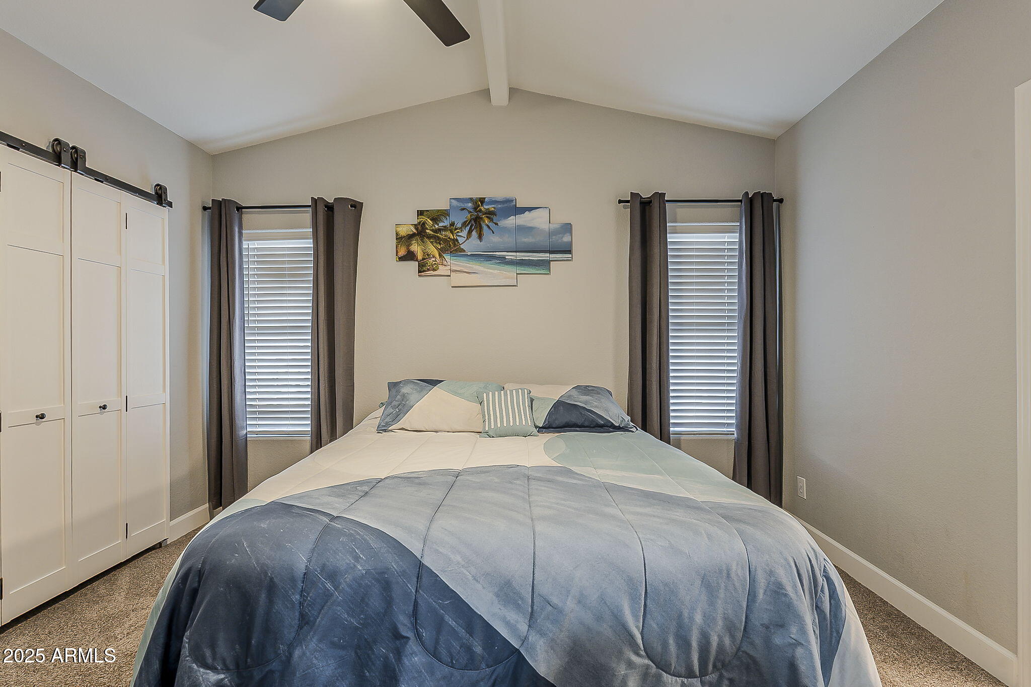 215 North Power Road, Unit 107 Mesa, AZ 85205 - Photo 21 of 49 a bedroom with a bed and a window