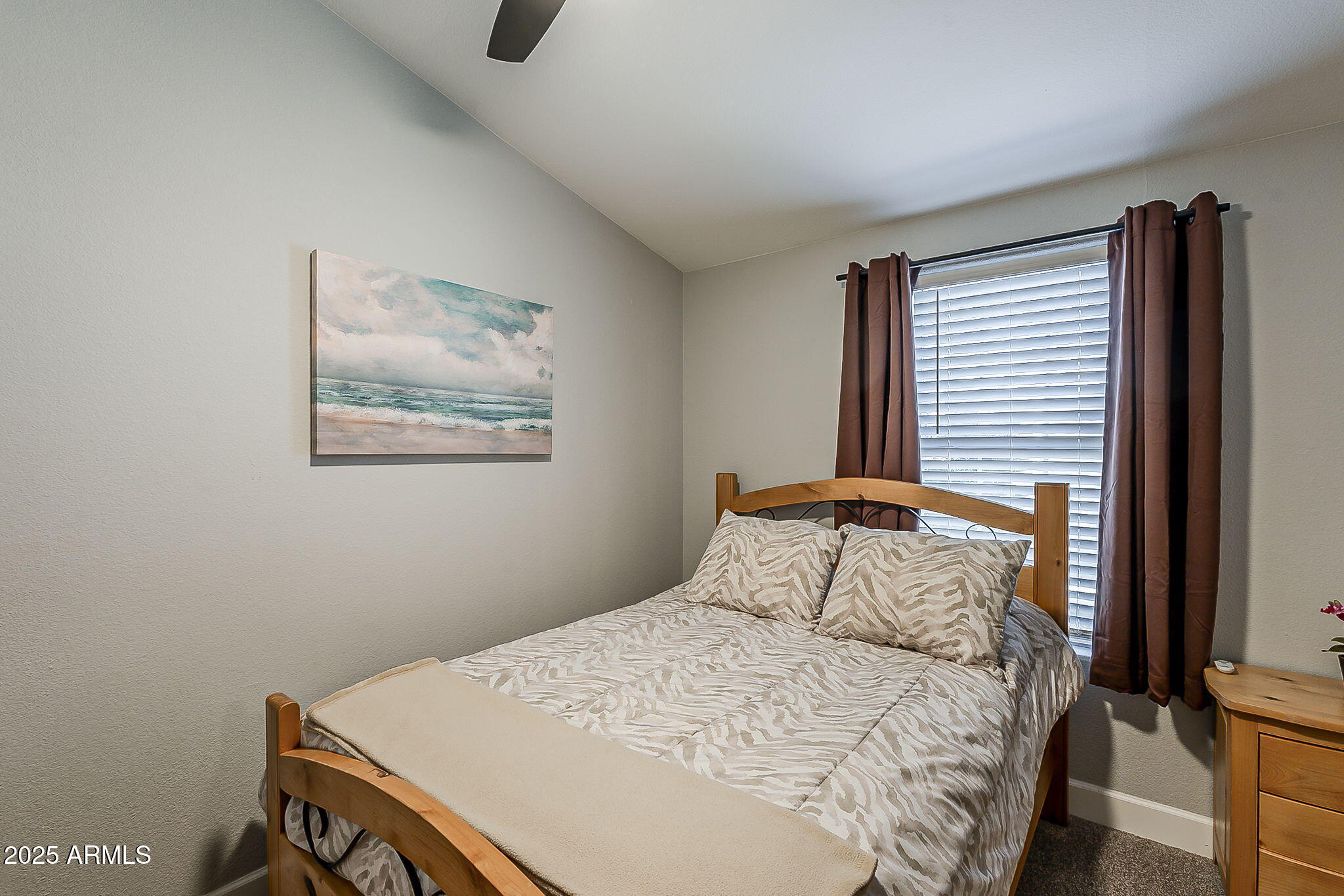 215 North Power Road, Unit 107 Mesa, AZ 85205 - Photo 29 of 49 a bedroom with a bed and a window