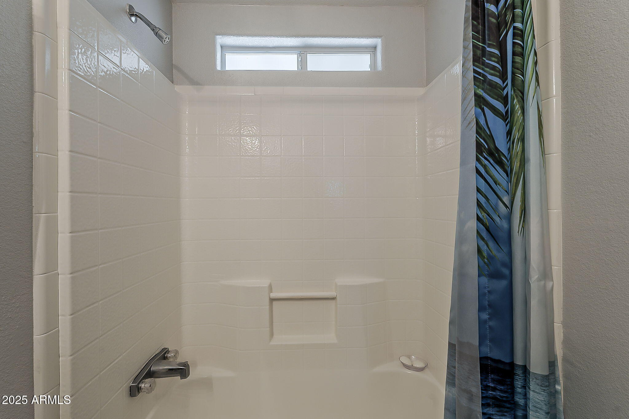 215 North Power Road, Unit 107 Mesa, AZ 85205 - Photo 31 of 49 a bathroom with a shower