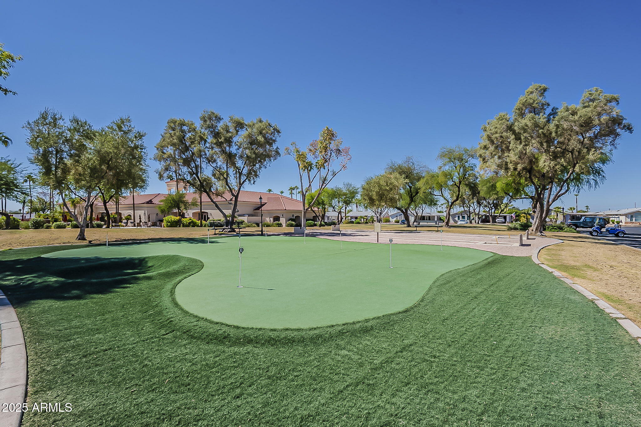 215 North Power Road, Unit 107 Mesa, AZ 85205 - Photo 34 of 49 a view of outdoor space with garden and trees