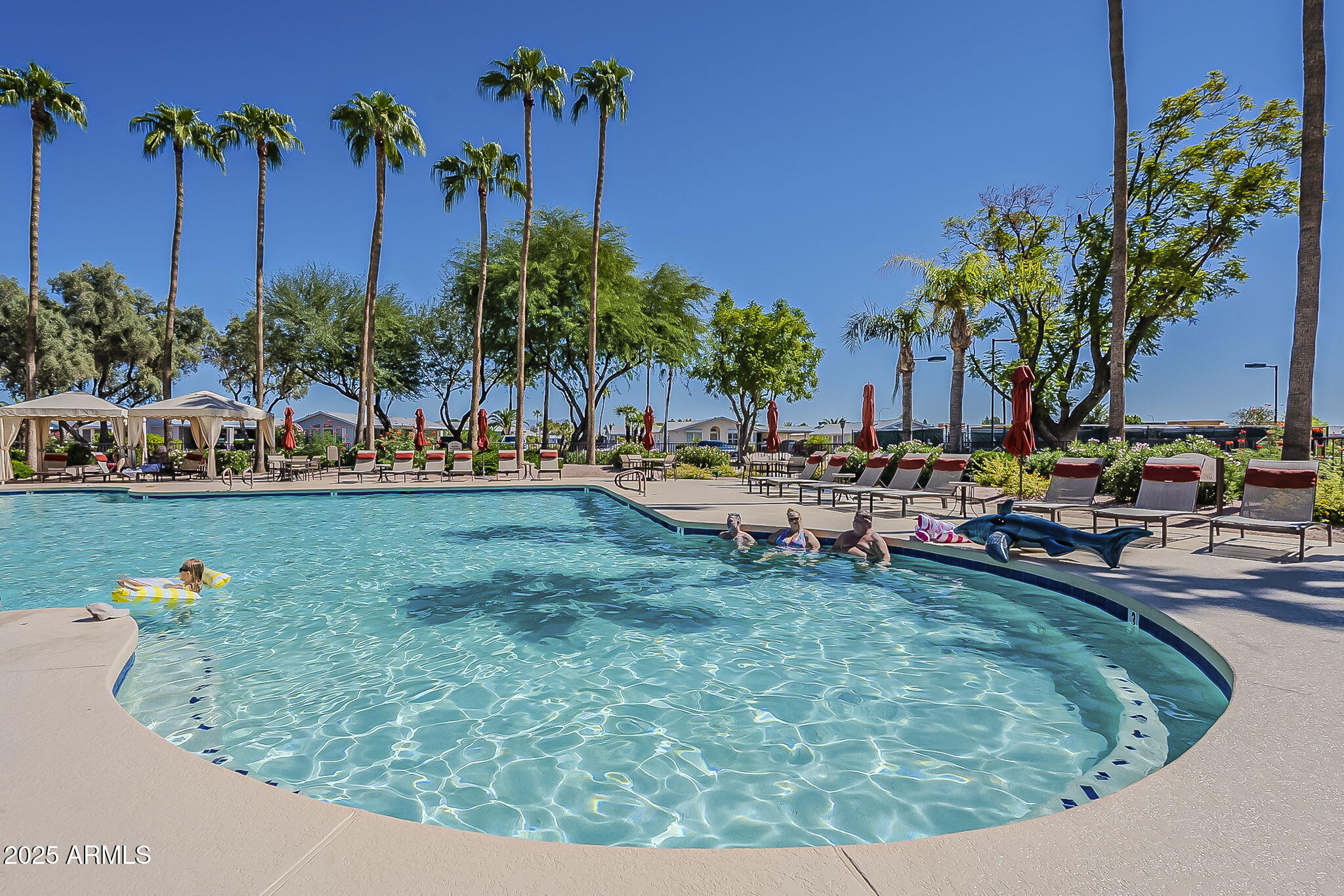 215 North Power Road, Unit 107 Mesa, AZ 85205 - Photo 43 of 49 a view of a swimming pool with outdoor seating