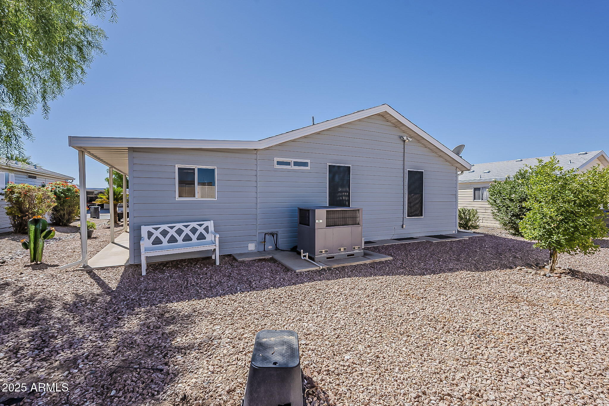 215 North Power Road, Unit 107 Mesa, AZ 85205 - Photo 46 of 49 a house view with a backyard space