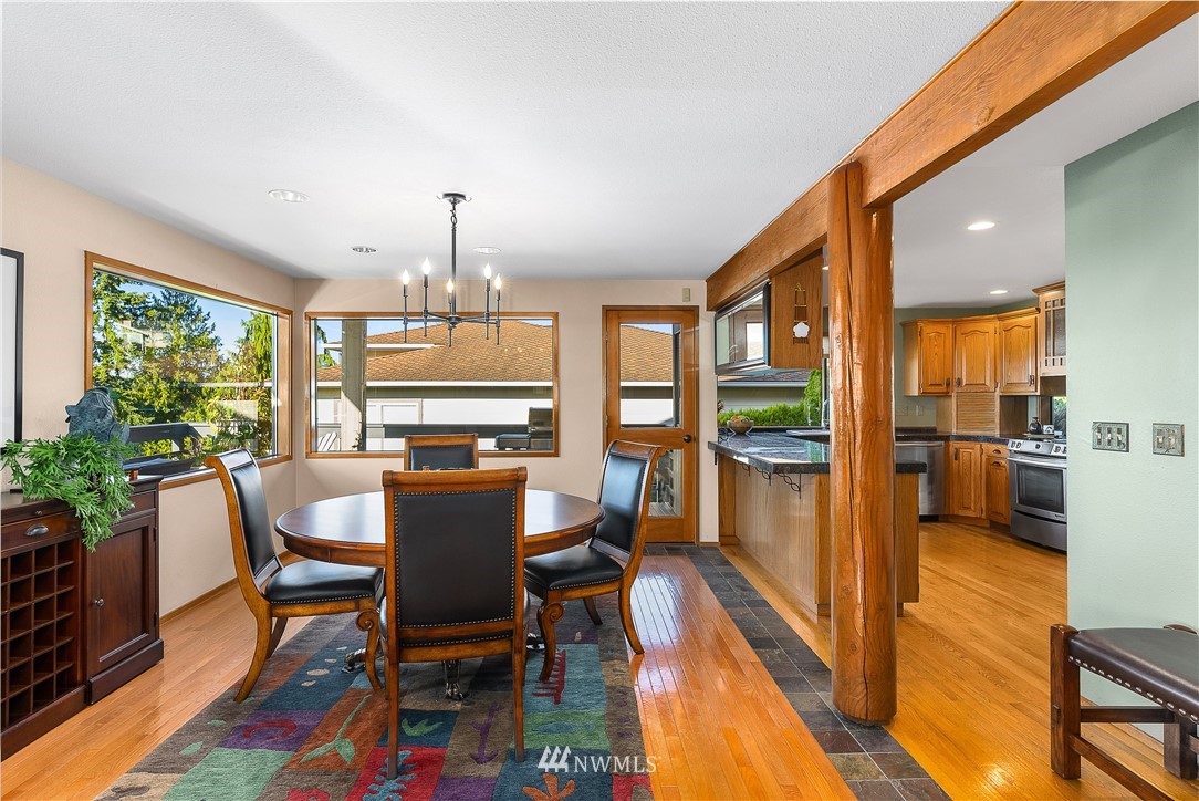 4910 23rd Avenue West Everett, WA 98203 - Photo 11 of 40 a view of a dining room with furniture window and outside view