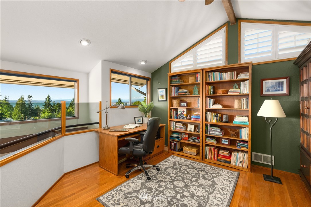 4910 23rd Avenue West Everett, WA 98203 - Photo 17 of 40 a view of a bedroom with furniture and windows