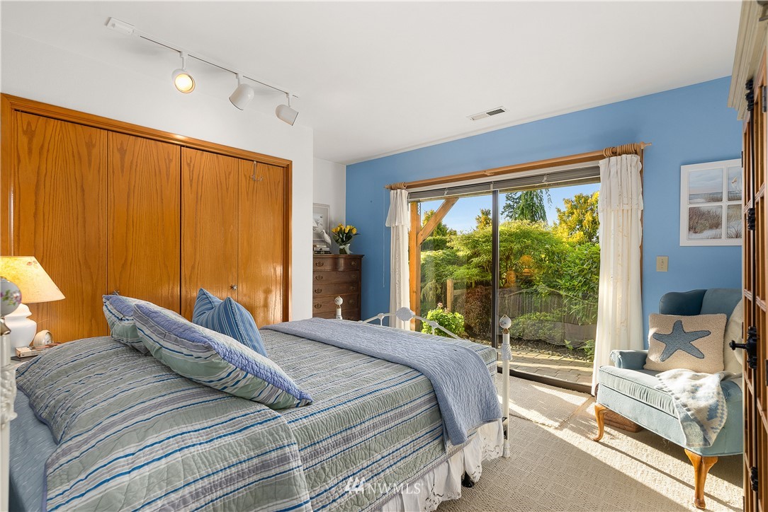 4910 23rd Avenue West Everett, WA 98203 - Photo 24 of 40 a bedroom with a bed and large window