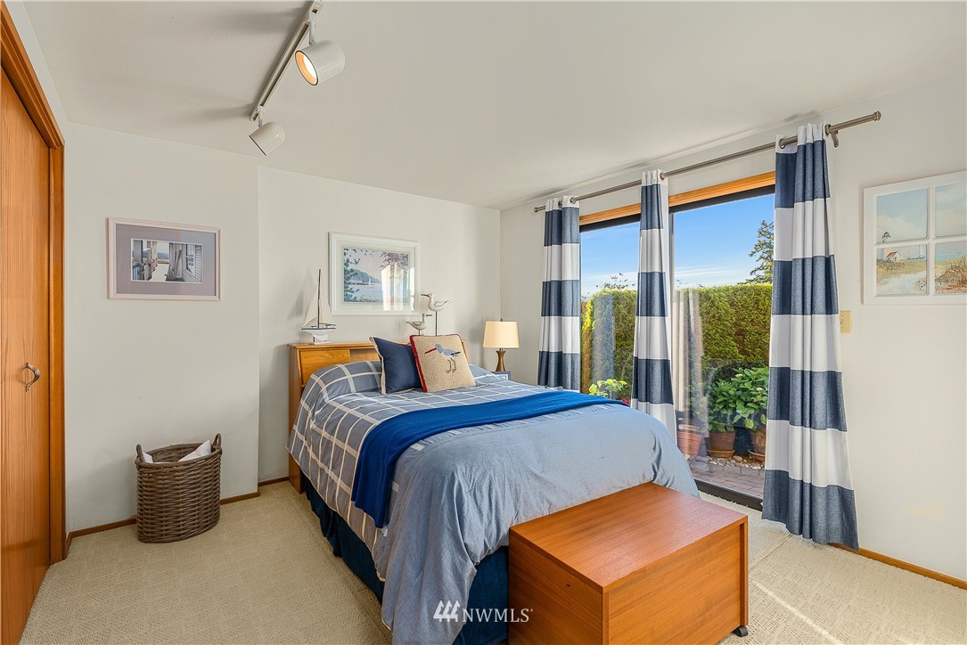 4910 23rd Avenue West Everett, WA 98203 - Photo 28 of 40 a bed room with a bed and a couch