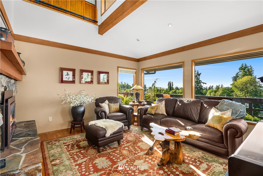 4910 23rd Avenue West Everett, WA 98203 - Photo 9 of 40 a living room with furniture a rug and a large window