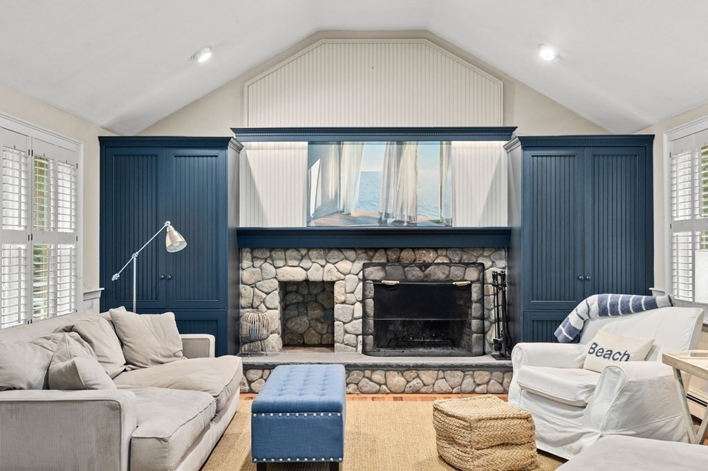6 Pheasant Run Hingham, MA 02043 - Photo 12 of 41 a living room with furniture and a fireplace
