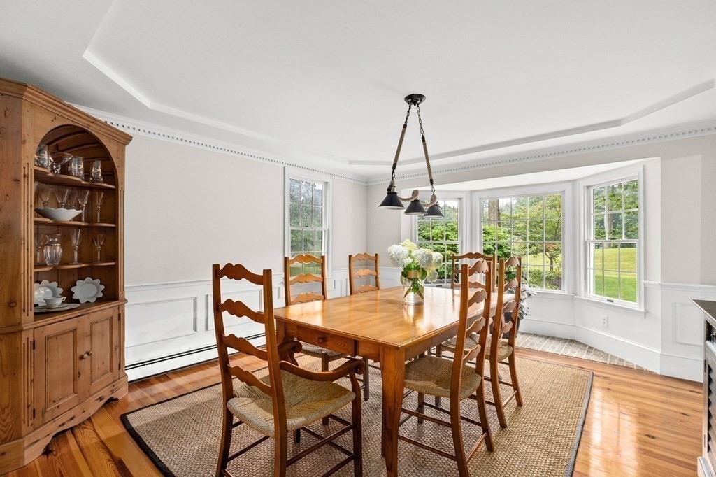 6 Pheasant Run Hingham, MA 02043 - Photo 16 of 41 a view of a dining room with furniture window and outside view