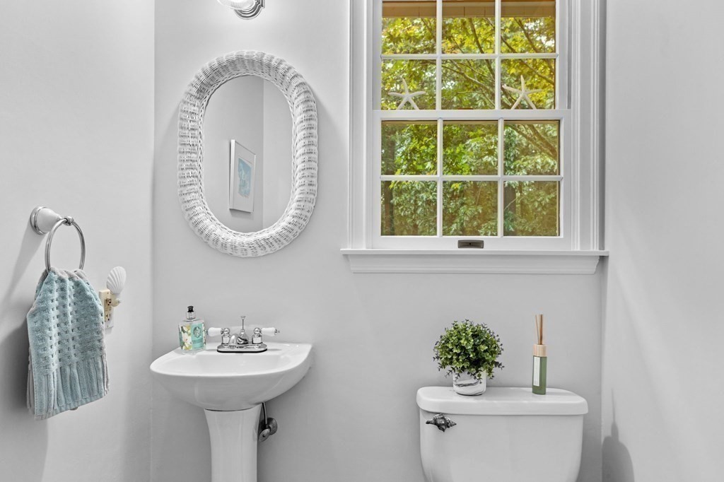 6 Pheasant Run Hingham, MA 02043 - Photo 18 of 41 a bathroom with a sink and a mirror