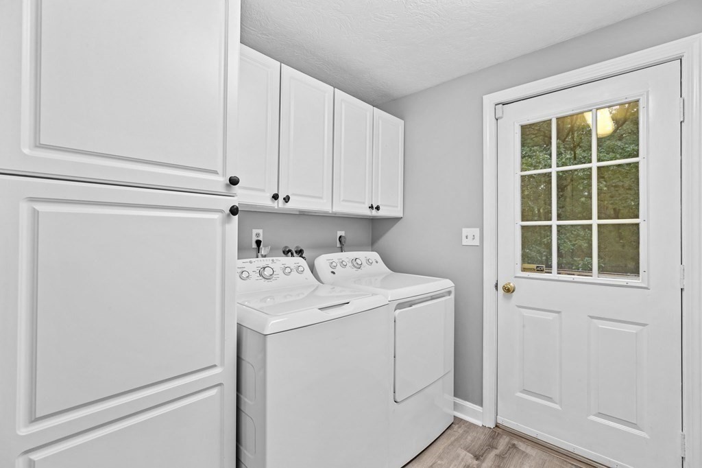 6 Pheasant Run Hingham, MA 02043 - Photo 19 of 41 a view of storage and utility room with washer and dryer