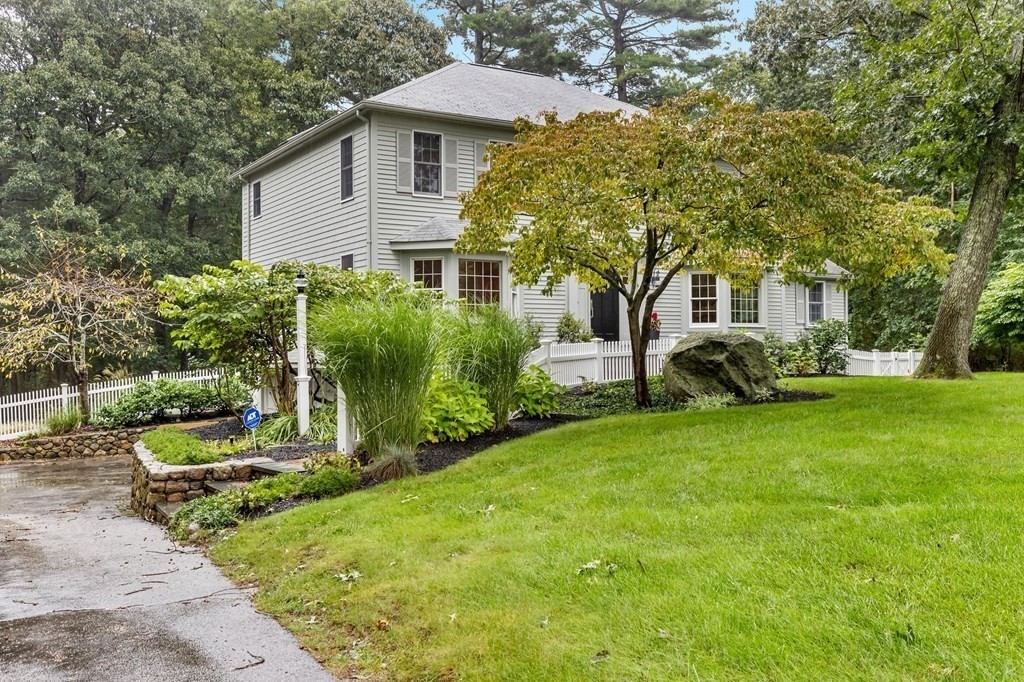 6 Pheasant Run Hingham, MA 02043 - Photo 2 of 41 a front view of a house with garden