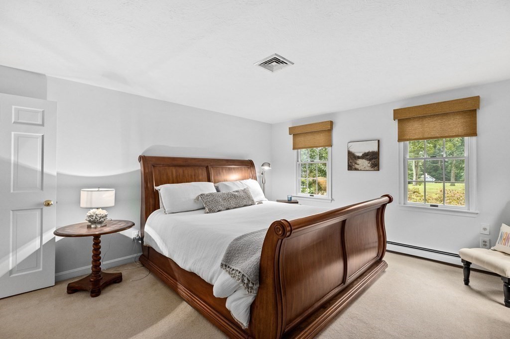 6 Pheasant Run Hingham, MA 02043 - Photo 22 of 41 a bedroom with a bed and a window