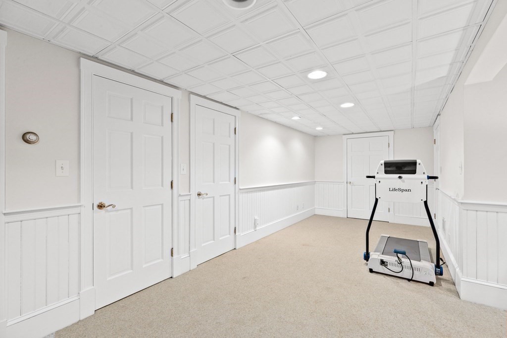6 Pheasant Run Hingham, MA 02043 - Photo 34 of 41 a room with gym equipment and white walls