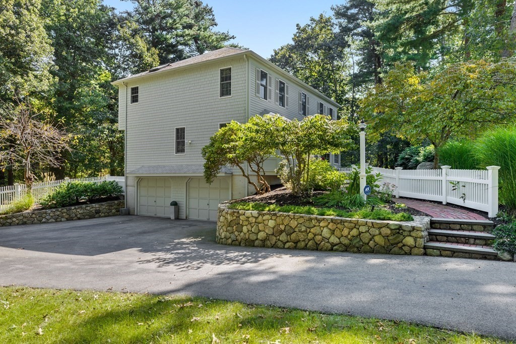 6 Pheasant Run Hingham, MA 02043 - Photo 37 of 41 a front view of a house with a yard