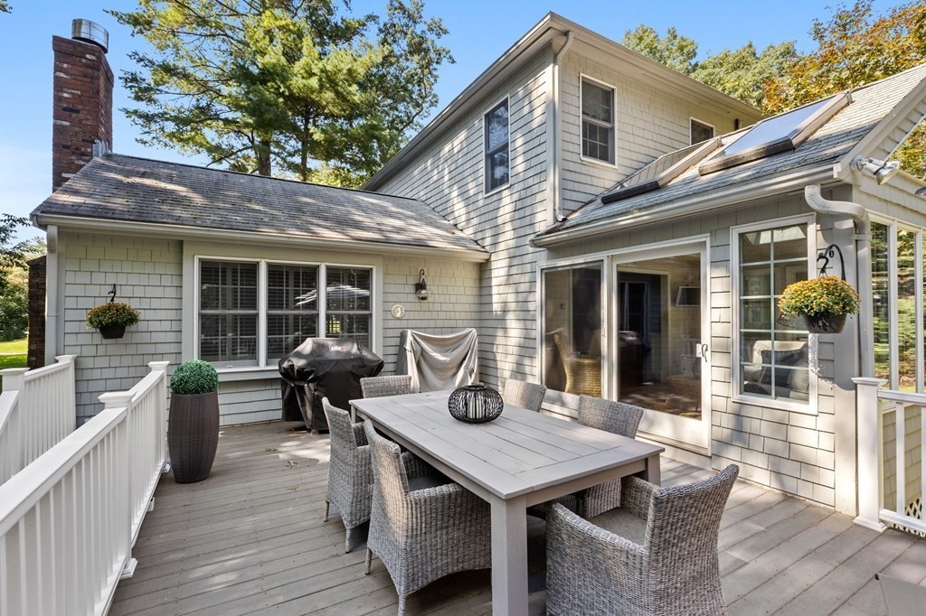 6 Pheasant Run Hingham, MA 02043 - Photo 38 of 41 a view of a deck with table and chairs