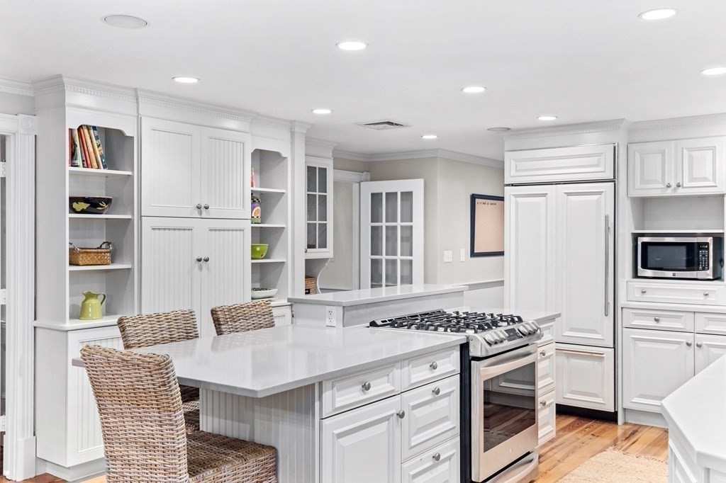 6 Pheasant Run Hingham, MA 02043 - Photo 7 of 41 a kitchen with a sink stove and refrigerator