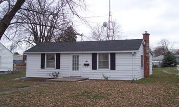 216 North 9th Street Rochelle, IL 61068 - Photo 1 of 1 a front view of a house with garden