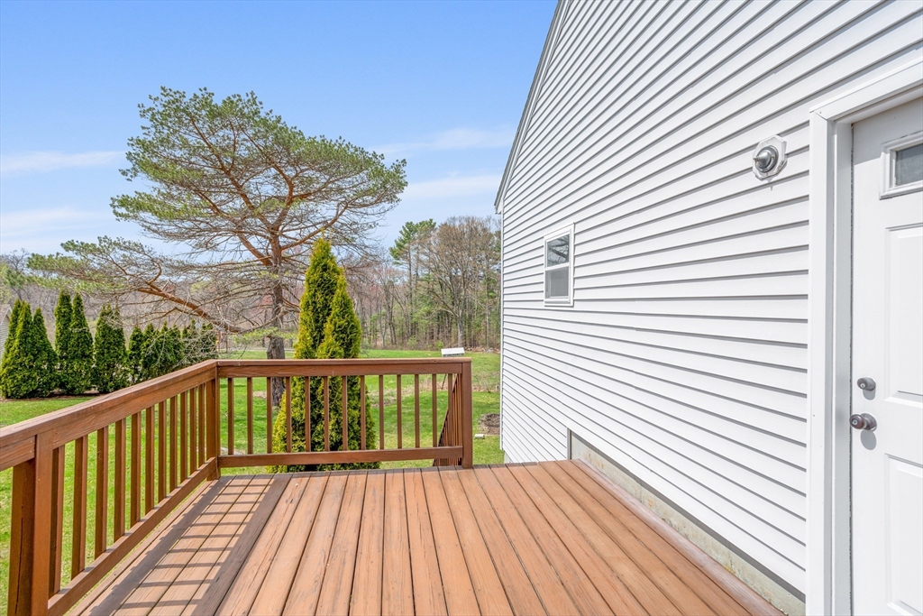 13 Lexington Road Billerica, MA 01821 - Photo 7 of 25 a view of a wooden deck