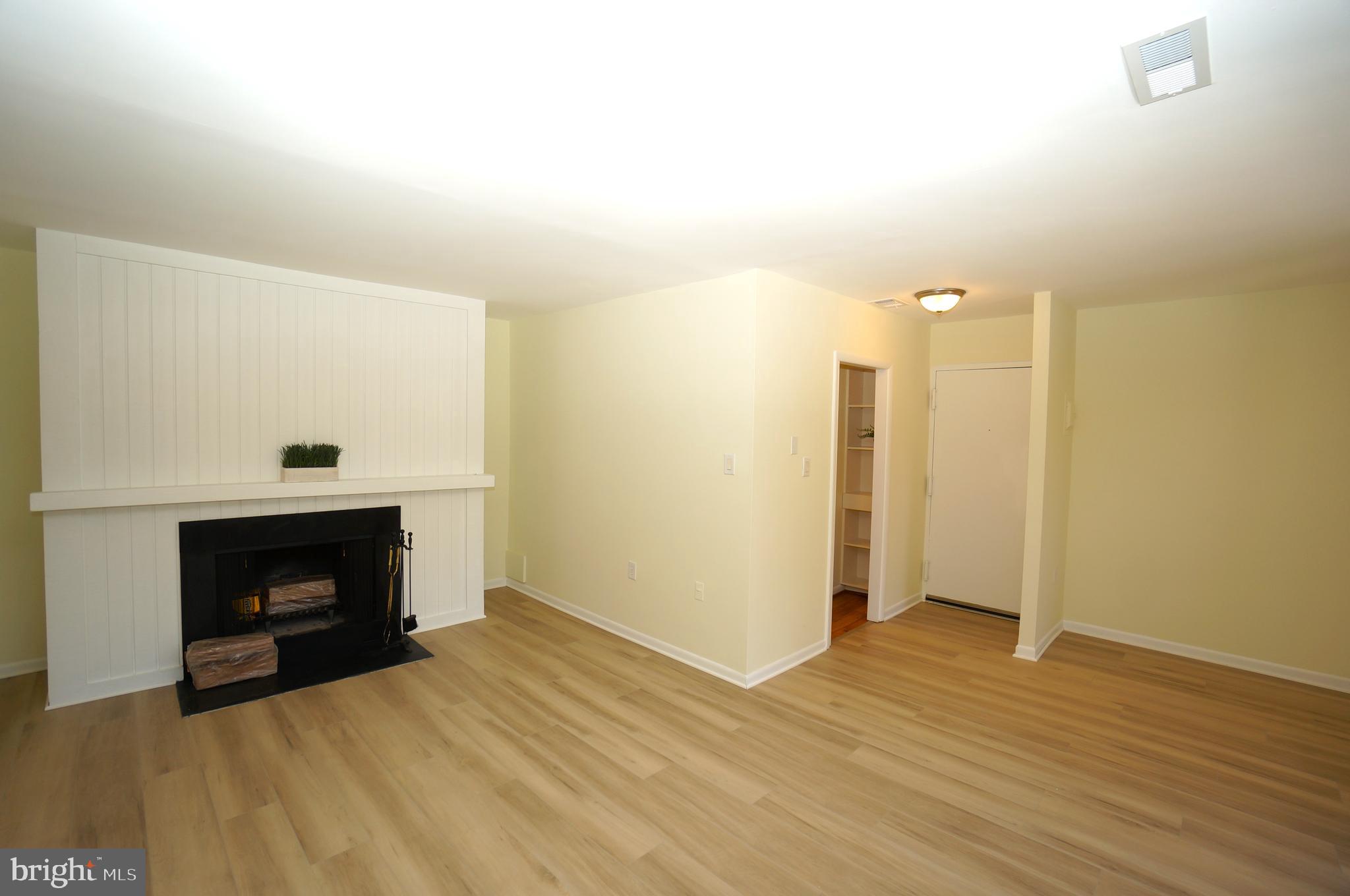 10551 Twin Rivers Road, Unit E1 Columbia, MD 21044 - Photo 8 of 22 Living Room to Kitchen & Dining Room