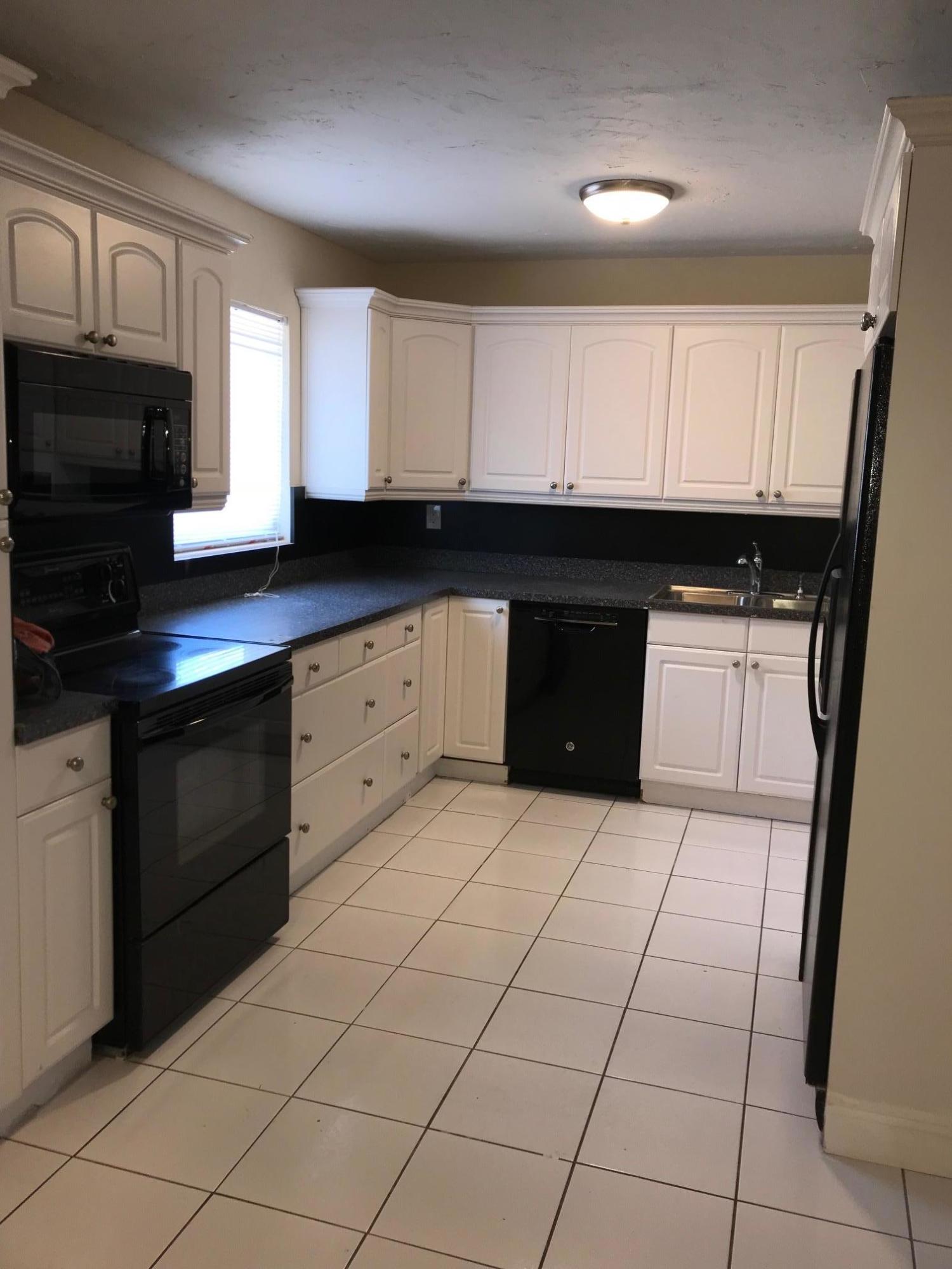 340 West 28th Street Riviera Beach, FL 33404 - Photo 6 of 12 IMG_3531
