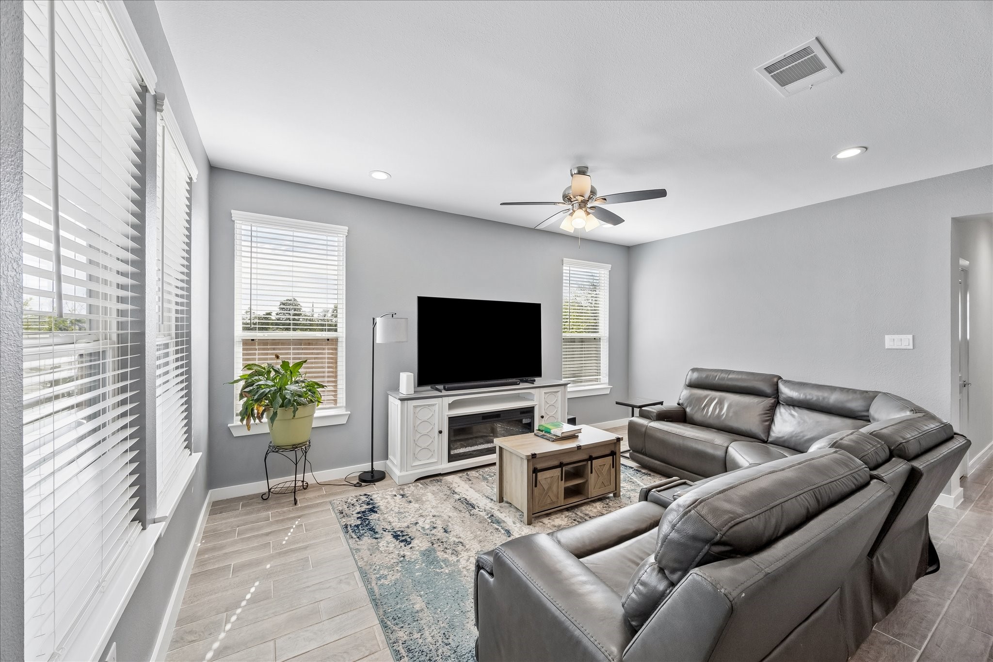 33002 Carolyns Perfection Loop Fulshear, TX 77441 - Photo 3 of 29 Natural light illuminates your living room