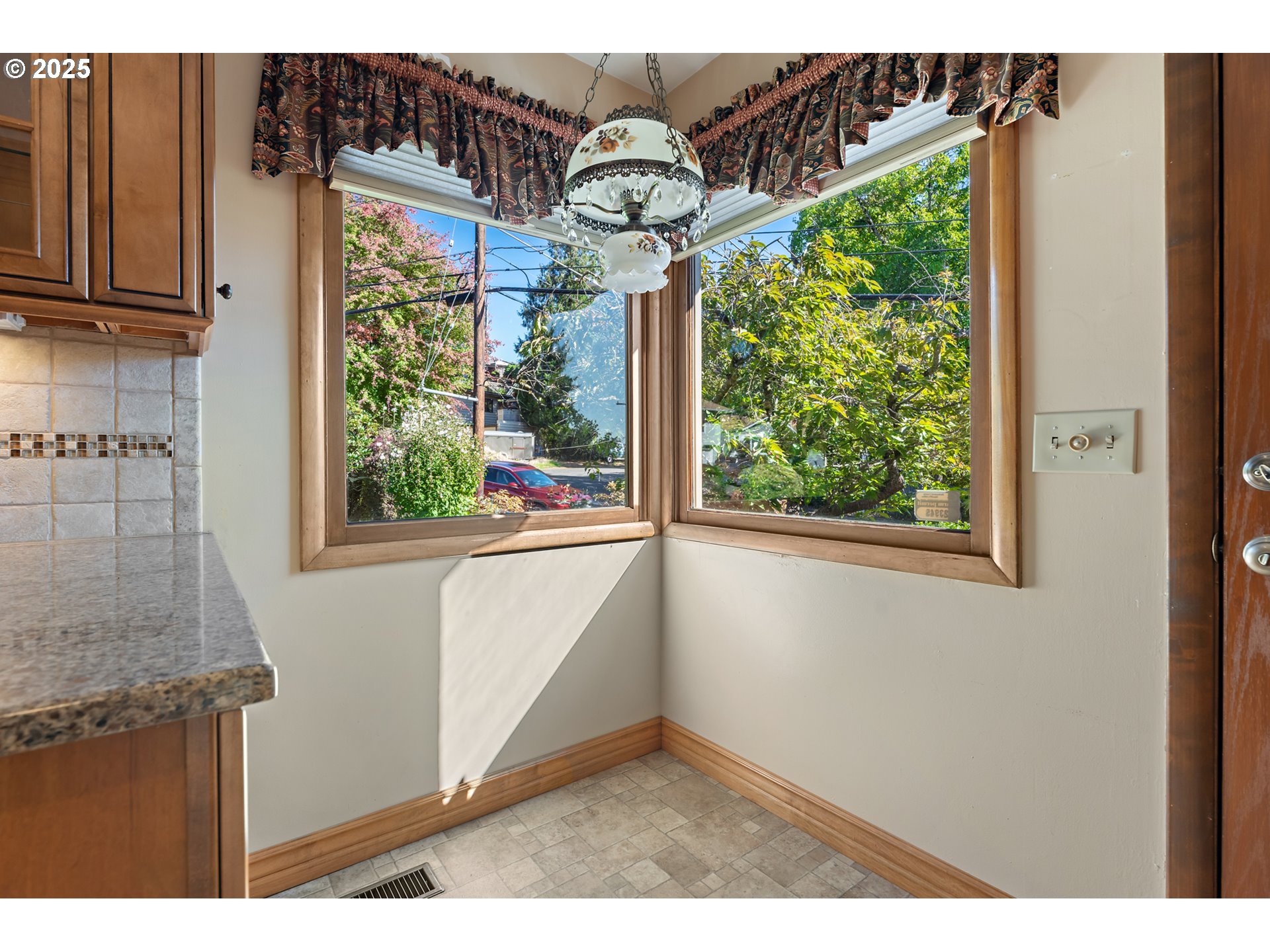 4430 Southeast Flavel Street Portland, OR 97206 - Photo 13 of 43 a very nice looking room with a large window