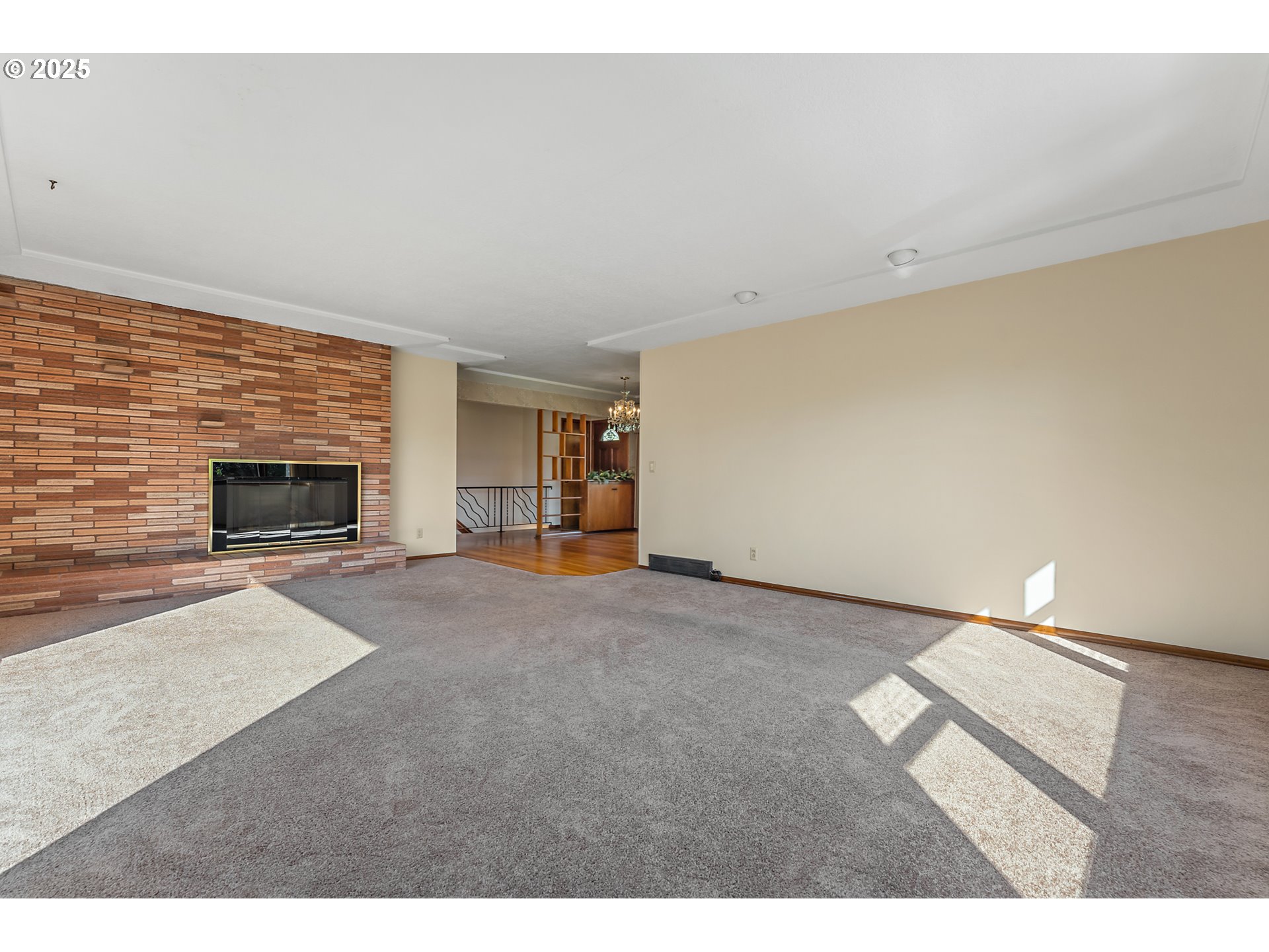 4430 Southeast Flavel Street Portland, OR 97206 - Photo 16 of 43 a view of empty room with fireplace