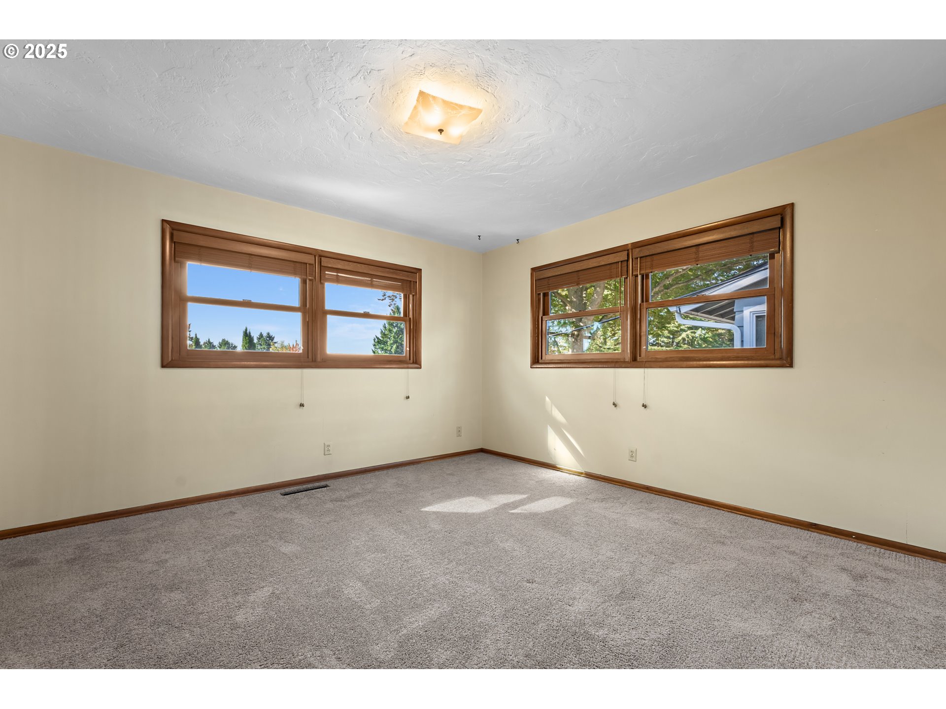 4430 Southeast Flavel Street Portland, OR 97206 - Photo 19 of 43 a view of an empty room with a window