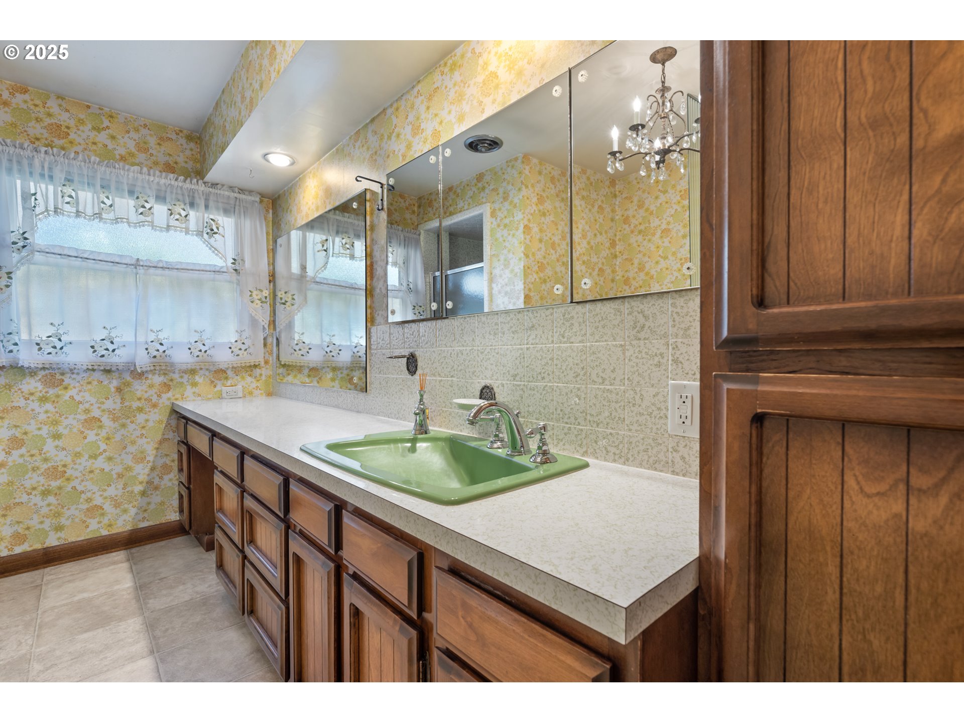 4430 Southeast Flavel Street Portland, OR 97206 - Photo 23 of 43 a bathroom with a sink and a mirror