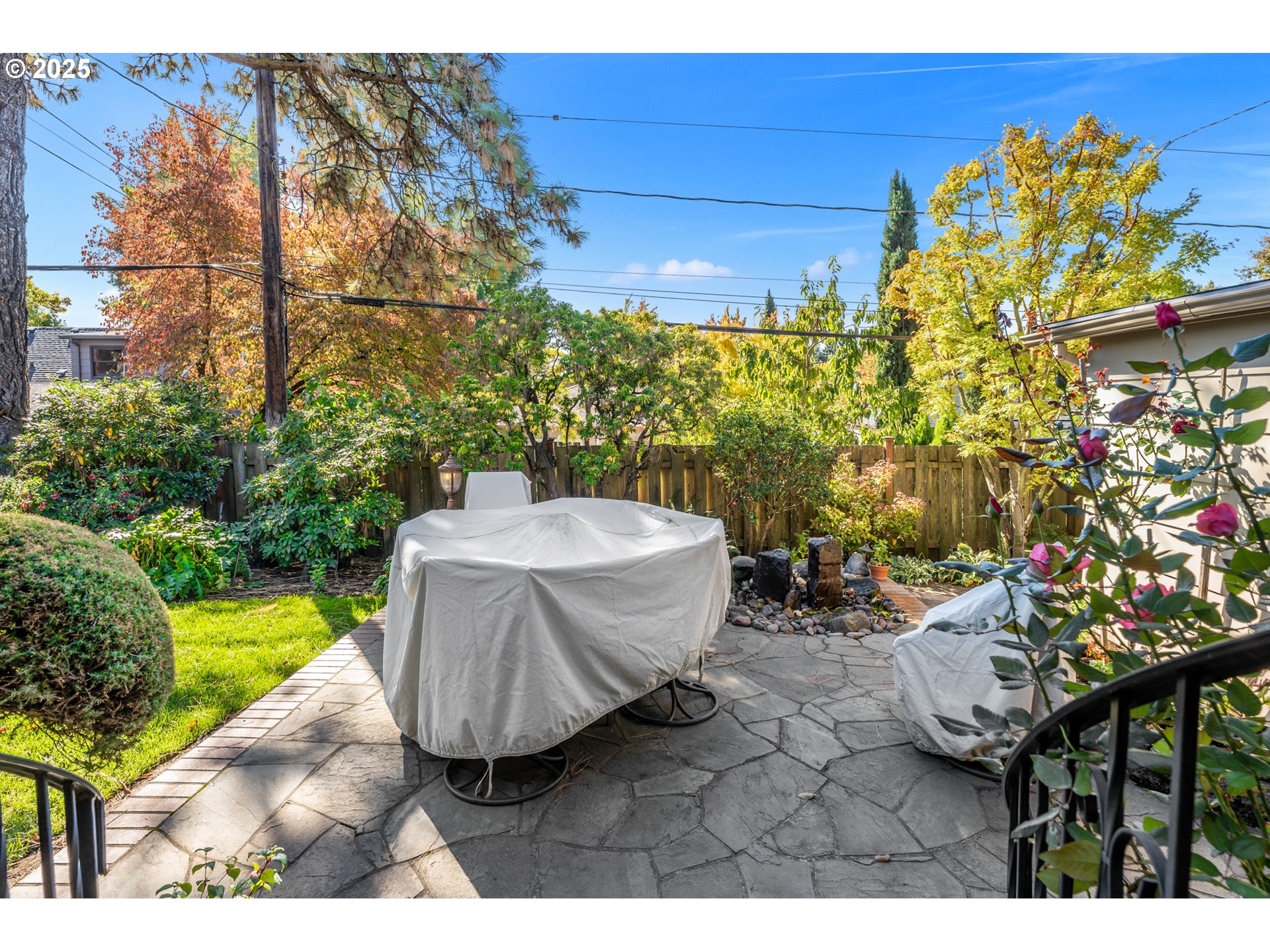 4430 Southeast Flavel Street Portland, OR 97206 - Photo 34 of 43 a view of a backyard with plants and a patio