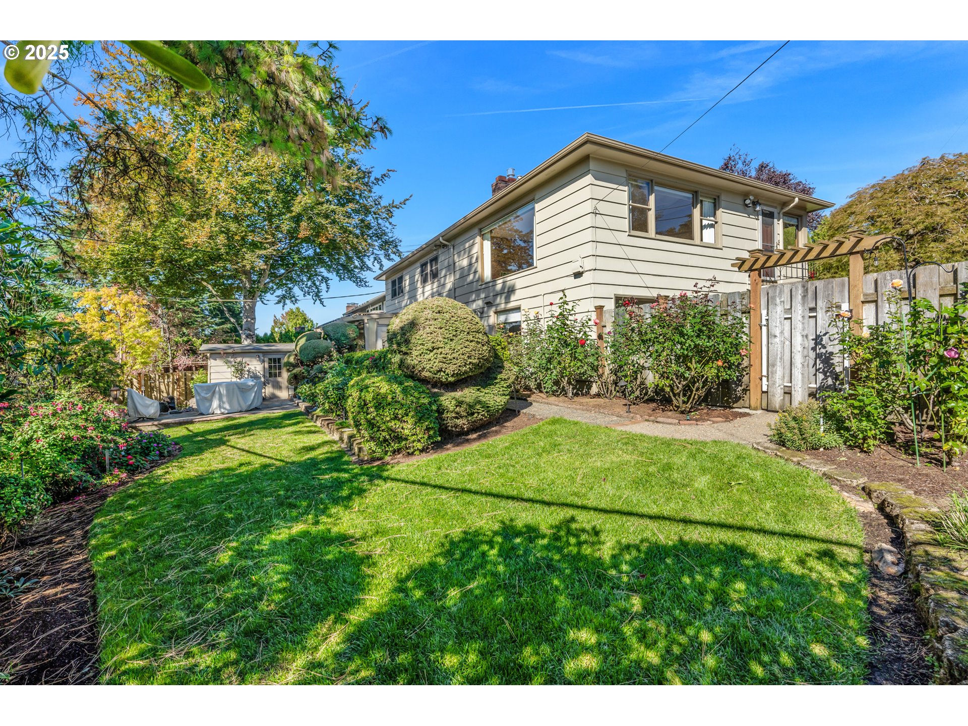 4430 Southeast Flavel Street Portland, OR 97206 - Photo 39 of 43 a view of a house with a yard