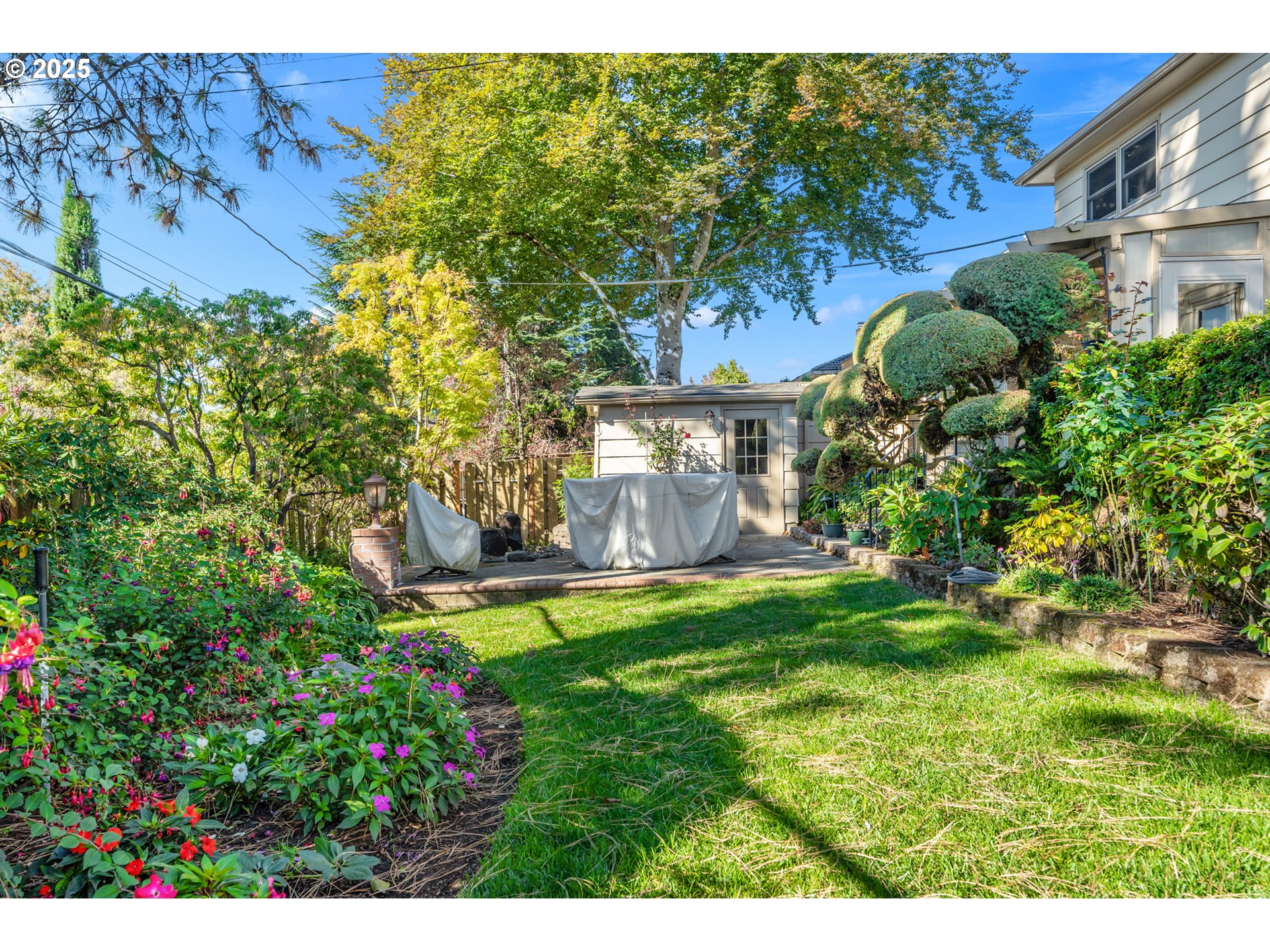 4430 Southeast Flavel Street Portland, OR 97206 - Photo 40 of 43 a view of a house with a garden