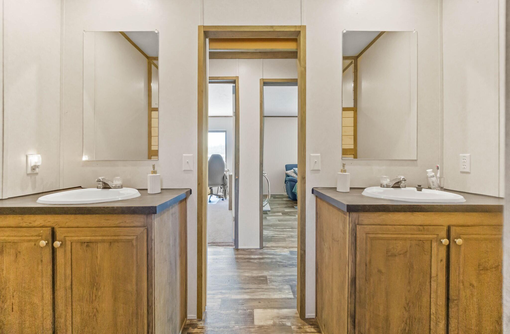 3139 Creek Road Bonifay, FL 32425 - Photo 15 of 41 a bathroom with a sink and a mirror