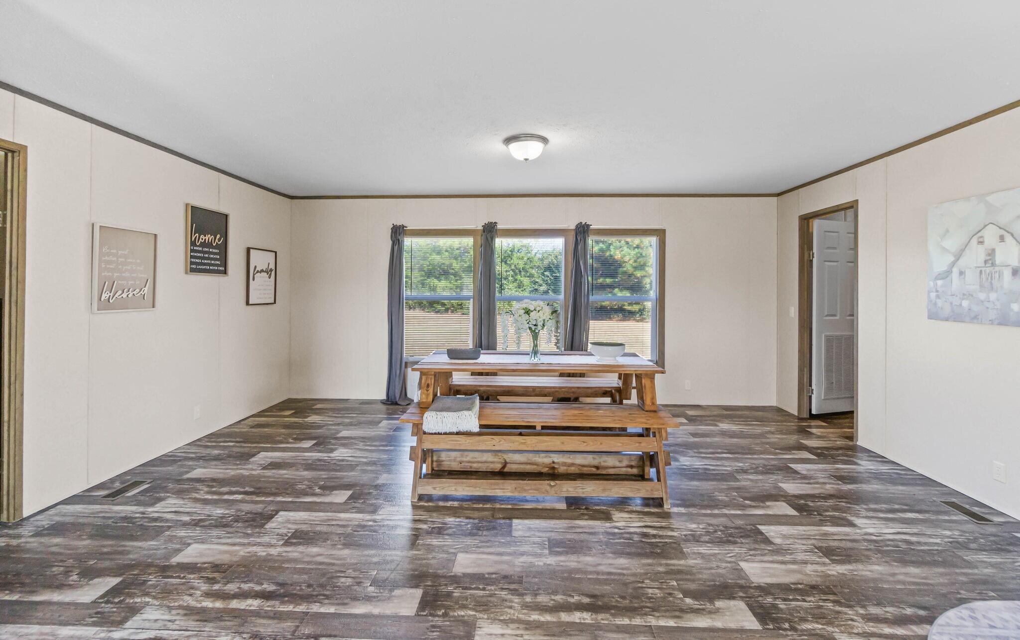 3139 Creek Road Bonifay, FL 32425 - Photo 5 of 41 a view of livingroom with furniture and staircase