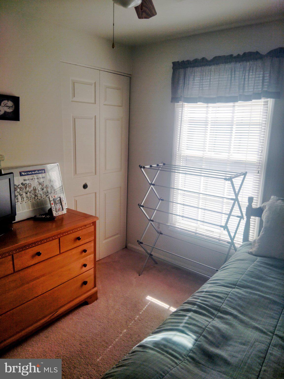 69 Johnson Smithsburg, MD 21783 - Photo 27 of 39 a view of room with window and wooden floor