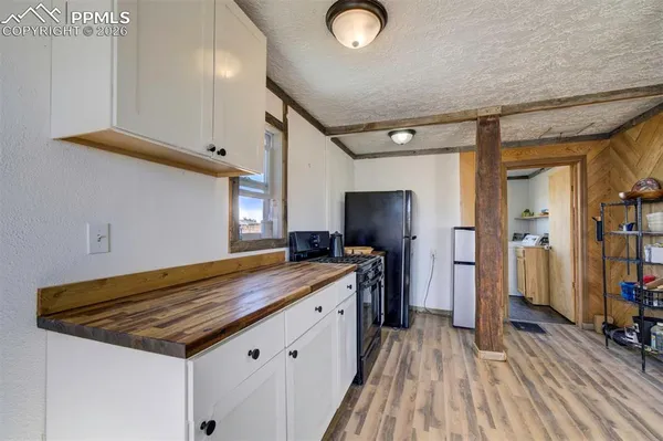 a utility room with a sink dryer and washer
