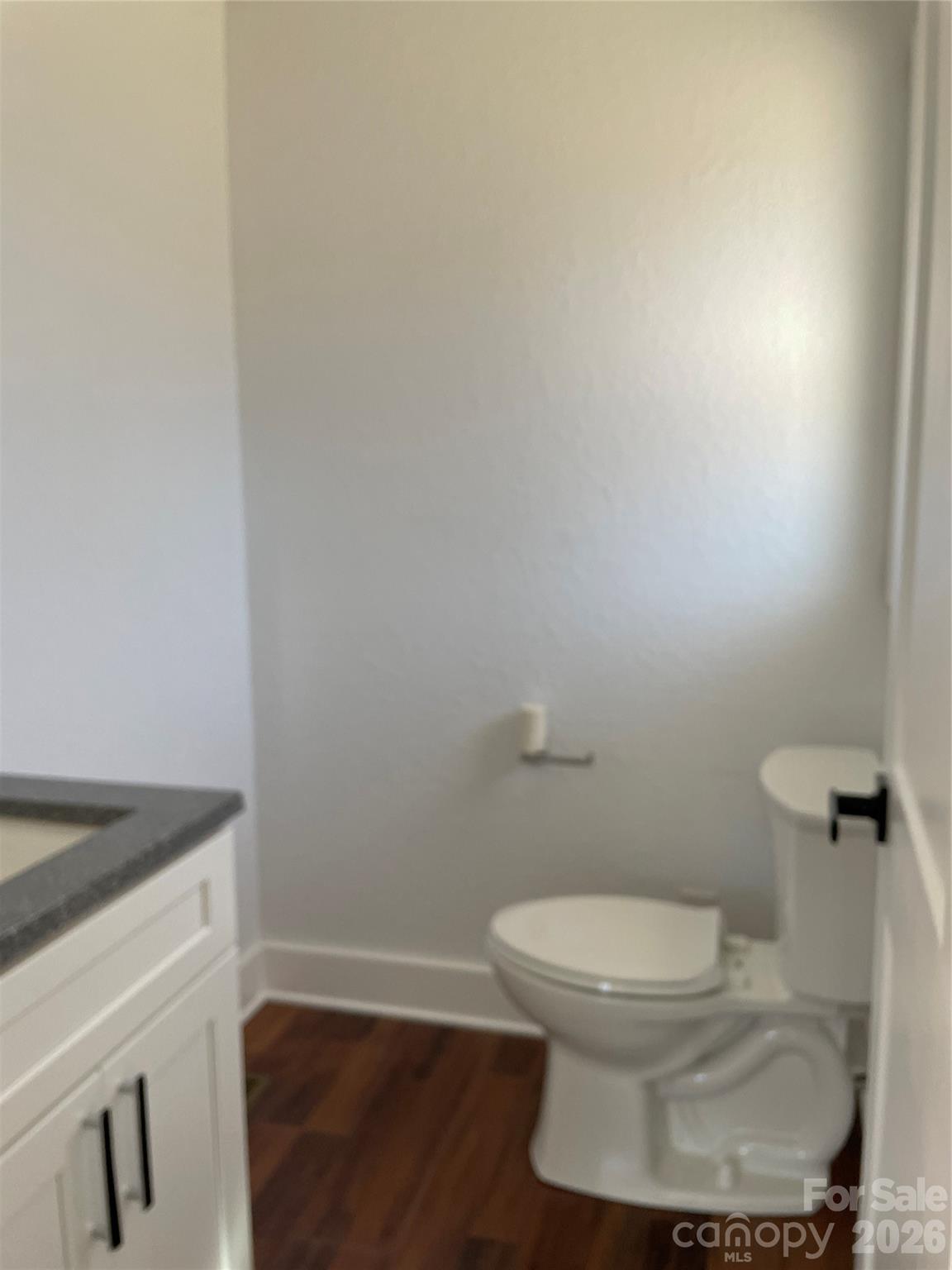 2019 Dale Road Spruce Pine, NC 28777 - Photo 14 of 18 a white toilet sitting next to a white sink