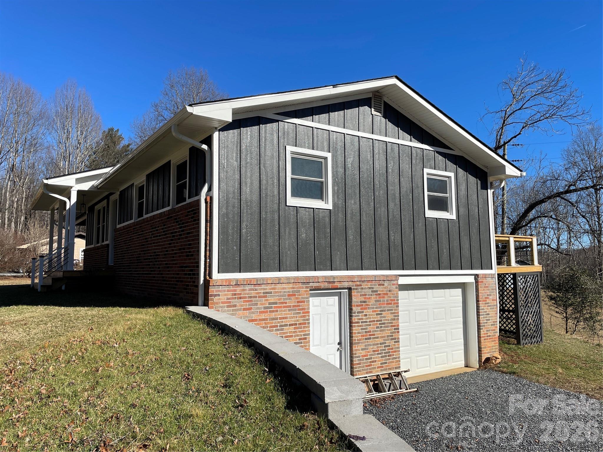 2019 Dale Road Spruce Pine, NC 28777 - Photo 2 of 18 a front view of a house with a yard