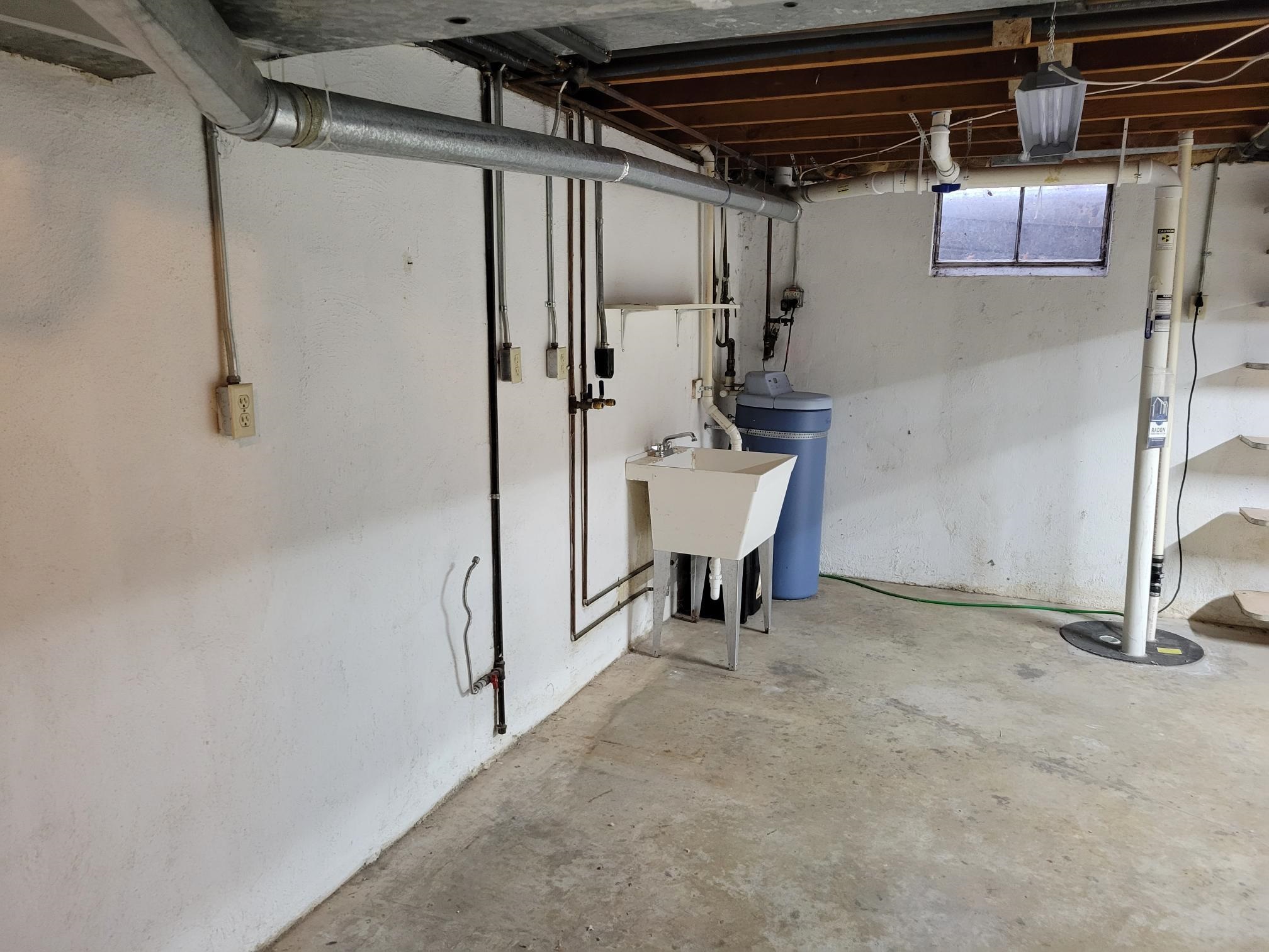 135 Redbud Drive Winfield, KS 67156 - Photo 28 of 29 There are plumbing and dryer hookups in the basement and in the kitchen