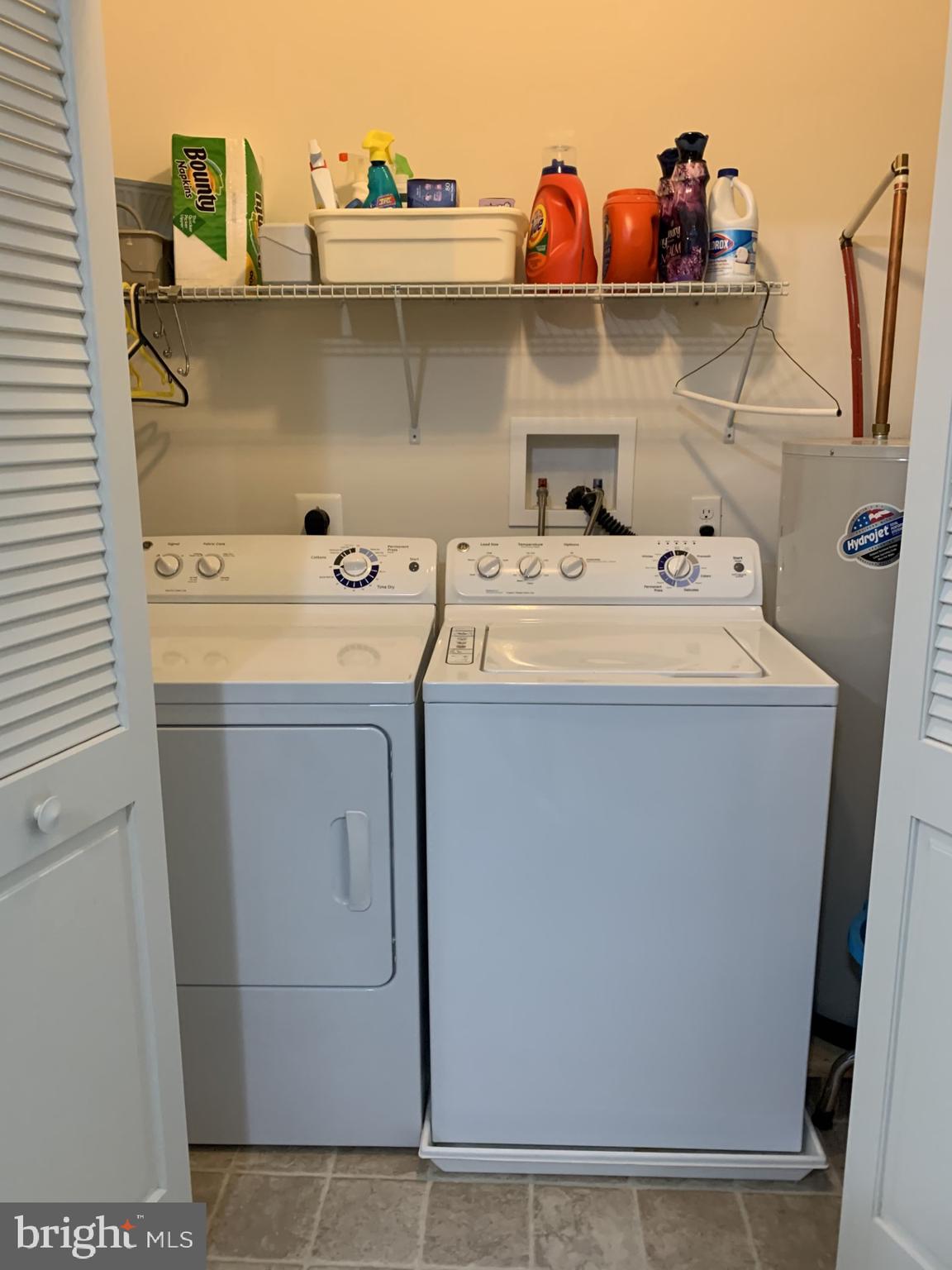 79 Legacy Boulevard, Unit 106 Sinking Spring, PA 19608 - Photo 10 of 11 a utility room with dryer and washer