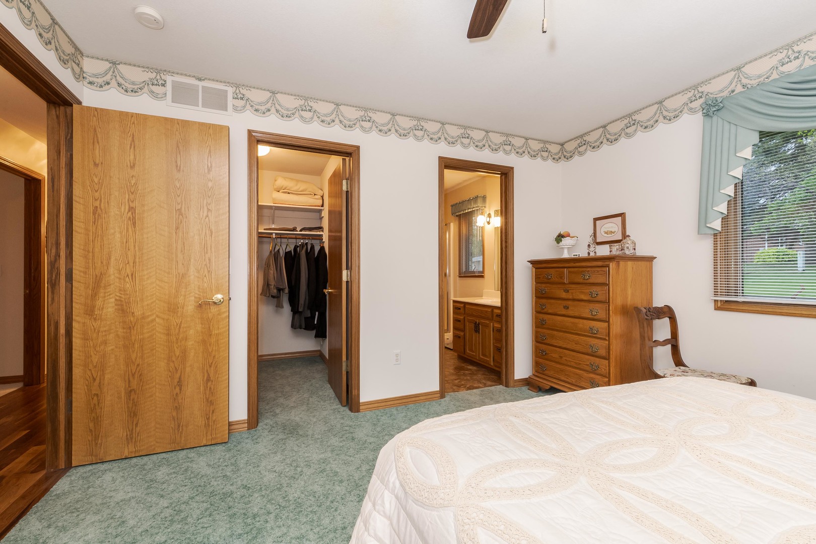 103 East 9th Street Gridley, IL 61744 - Photo 18 of 45 a bedroom with a bed and a dresser